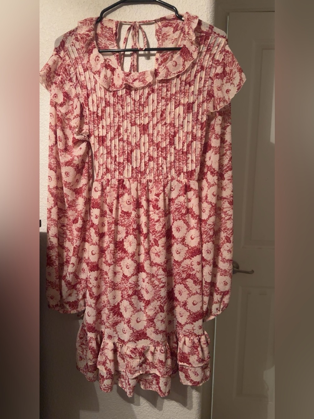 Free people Flowy Dream and Red Floral Pintuck Dress with Bow in the back.